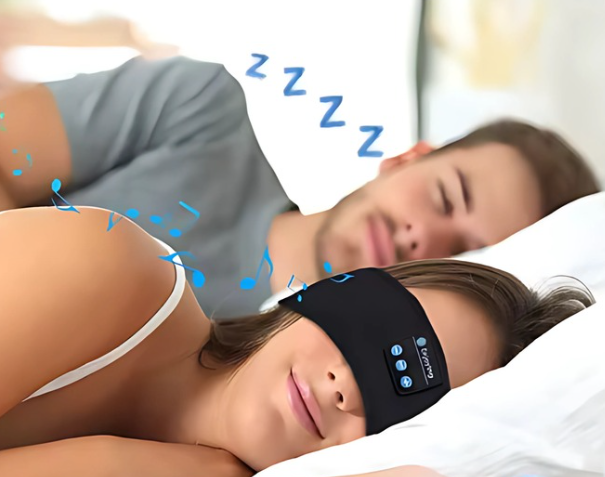 Person wearing the audio sleeping mask in bed, listening to soothing music or white noise for a peaceful and uninterrupted sleep