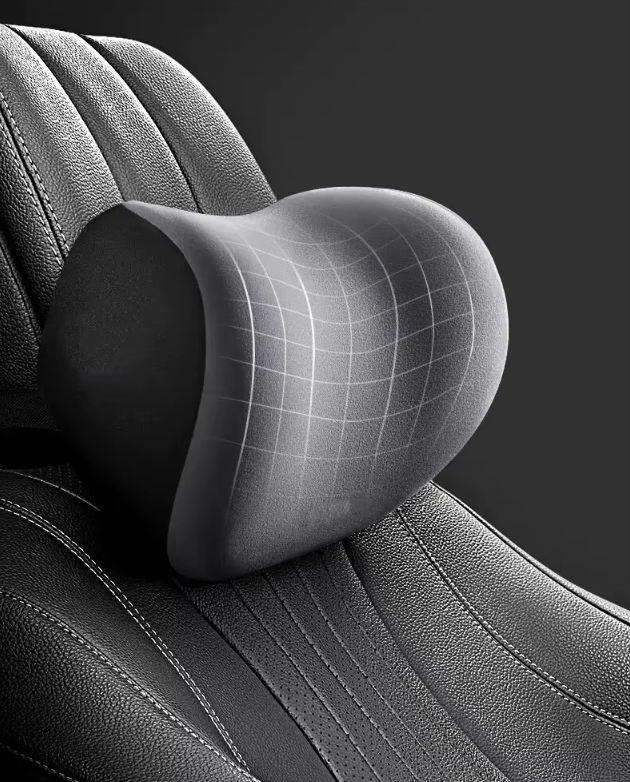 Neck pain relief cushion providing ergonomic support on a car seat for comfortable driving and reduced neck strain